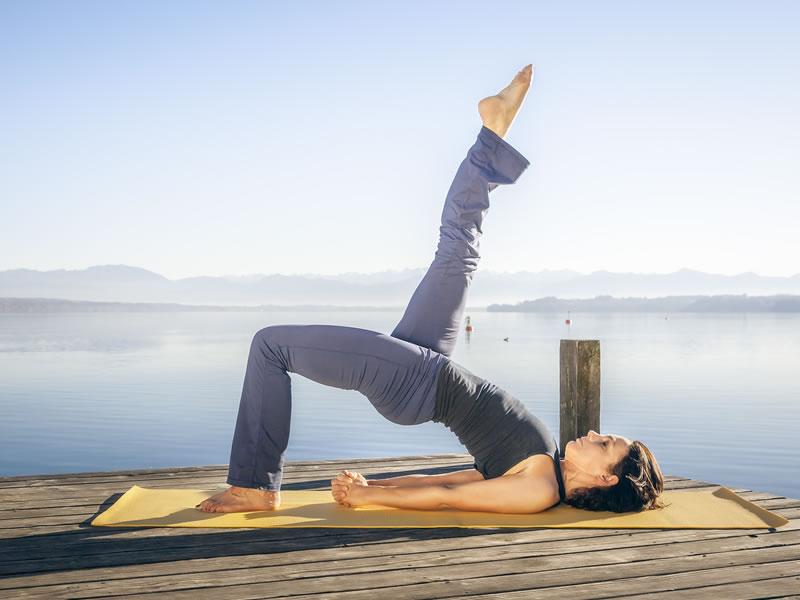 Woman doing Yoga Bridge pose